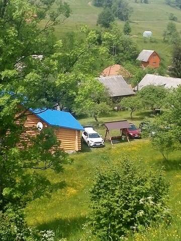 Фото номера Двухместный номер с 1 кроватью, вид на сад Мотели Cottage Лісовий г. Bukovets 3